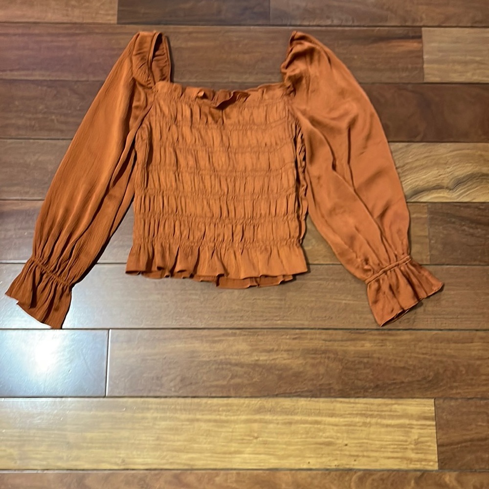 Women’s smocked top. Size medium.